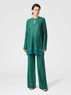 Blouse à manches longues en zigzag avec paillettes et franges