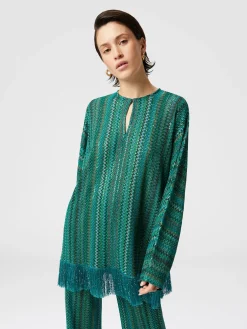 Blouse à manches longues en zigzag avec paillettes et franges