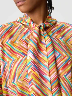 Blouse asymétrique en coton et soie mélangés imprimés