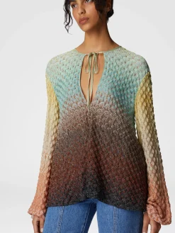 Blouse en dentelle dégradée avec décolleté en V