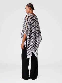 Cape en maille avec motif chevron