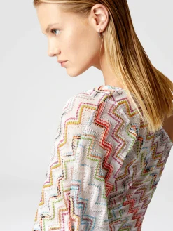 Haut asymétrique avec zigzag lamé 3D et manches larges