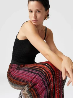 Jupe longue partielle rayée à sequins