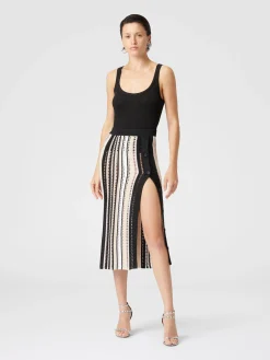 Jupe midi rayée en crochet avec boutonnage sur le côté