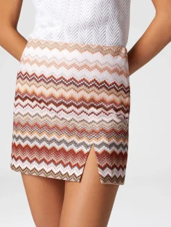 Mini-jupe à motif zigzag dentelé lamé et fente