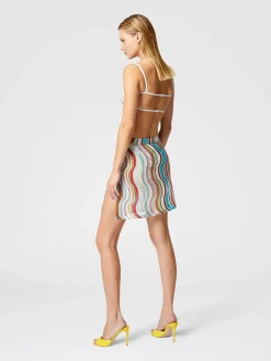 Minijupe couvrante à motif vague lamé et fente