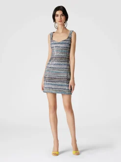 Mini-robe en maille lamée avec décolleté en cœur