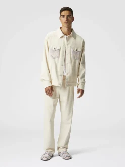 Pantalon en denim classique avec empiècements en tricot à chevrons