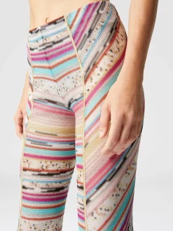 Pantalon en viscose flammée lamé avec fentes dans le bas