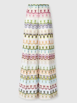 Pantalon long taille haute avec motif floral abstrait