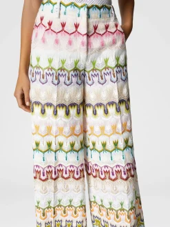 Pantalon long taille haute avec motif floral abstrait