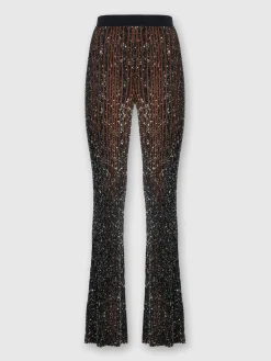 Pantalon évasé stretch côtelé à sequins