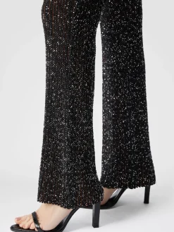 Pantalon évasé stretch côtelé à sequins