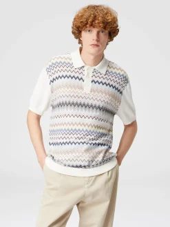 Polo en maille de coton zigzag avec empiècements de couleur unie