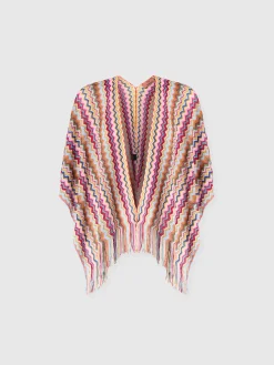 Poncho en maille avec motif chevron et franges