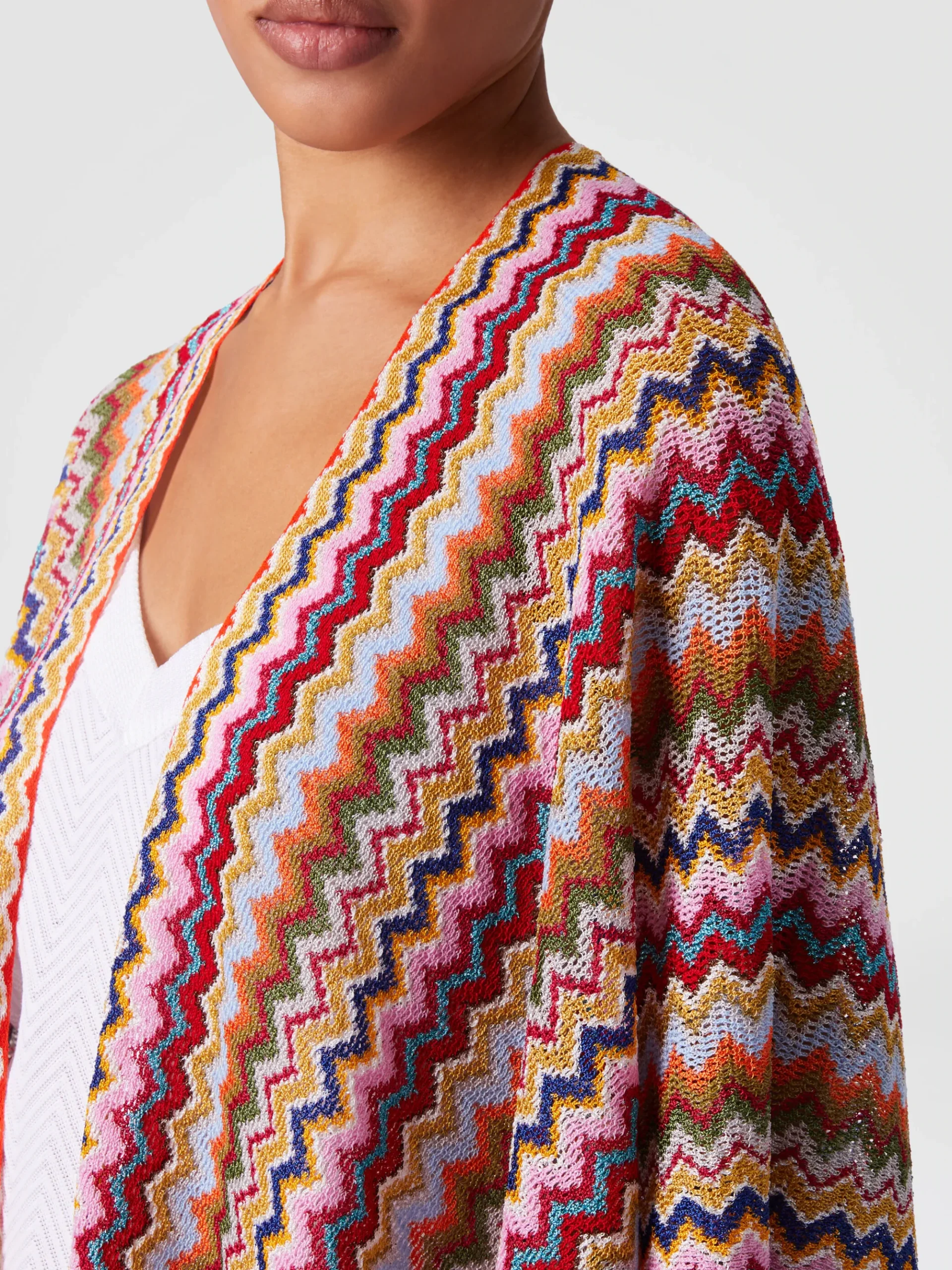 Poncho en maille avec motif chevron et franges