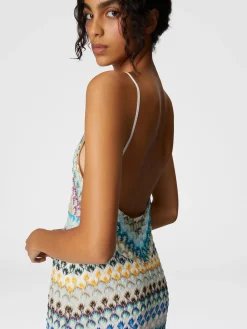 Robe courte sans manches avec jupe à volants en dentelle