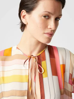 Robe longue couvrante en soie imprimée à manches longues