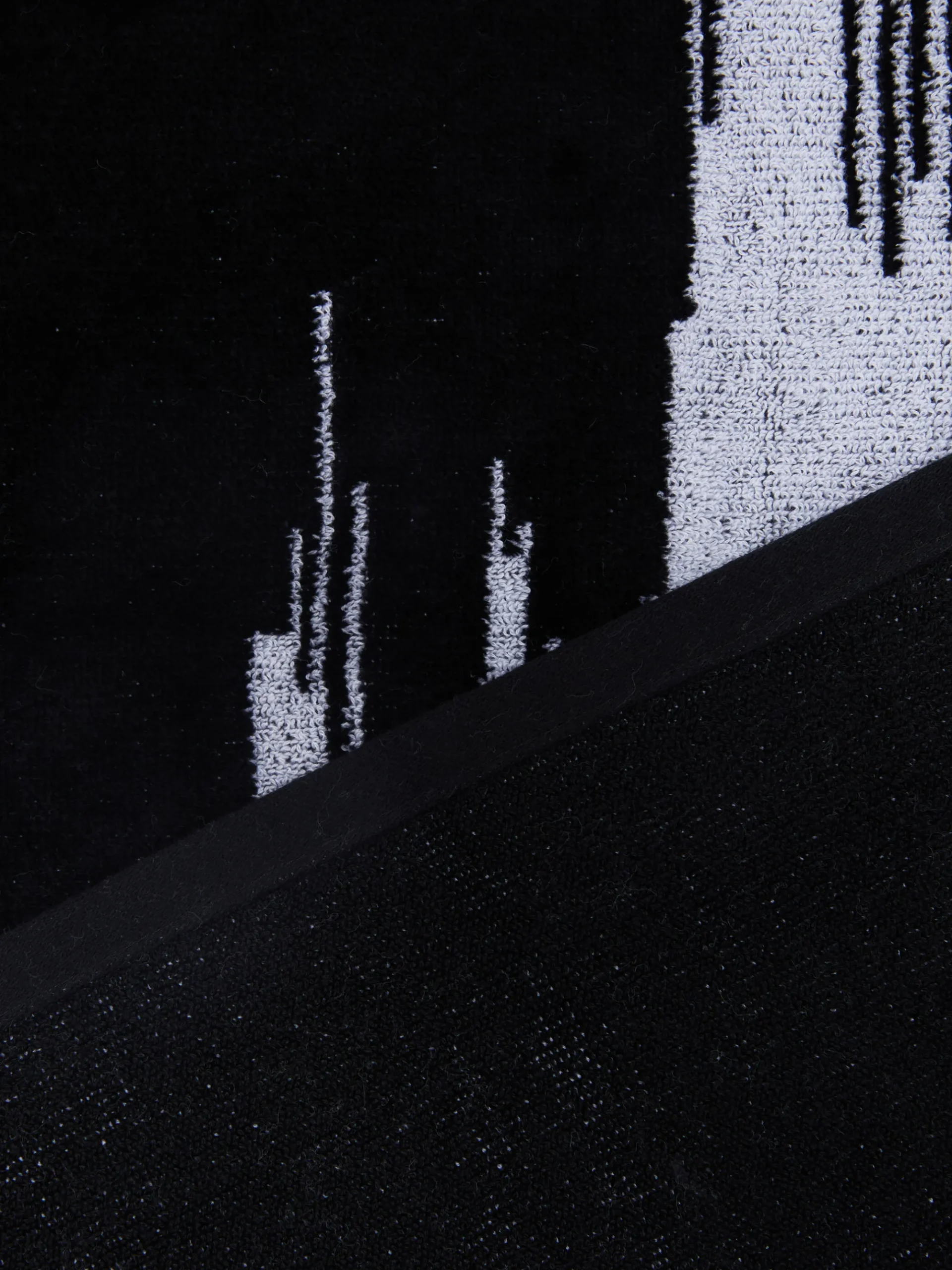 Serviette de plage Skunk 180x100cm en tissu de coton éponge flammé