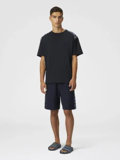 T-shirt à col rond en coton avec empiècements à chevrons sur les épaules