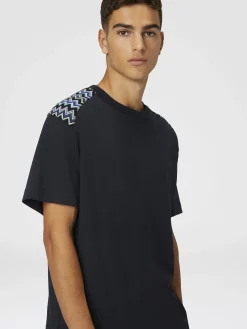 T-shirt à col rond en coton avec empiècements à chevrons sur les épaules
