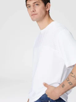 T-shirt ras du cou en coton avec empiècement en zigzag ton sur ton