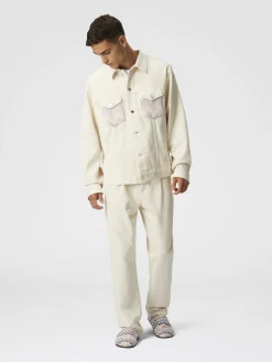 Veste en jean avec empiècements en tricot à chevrons